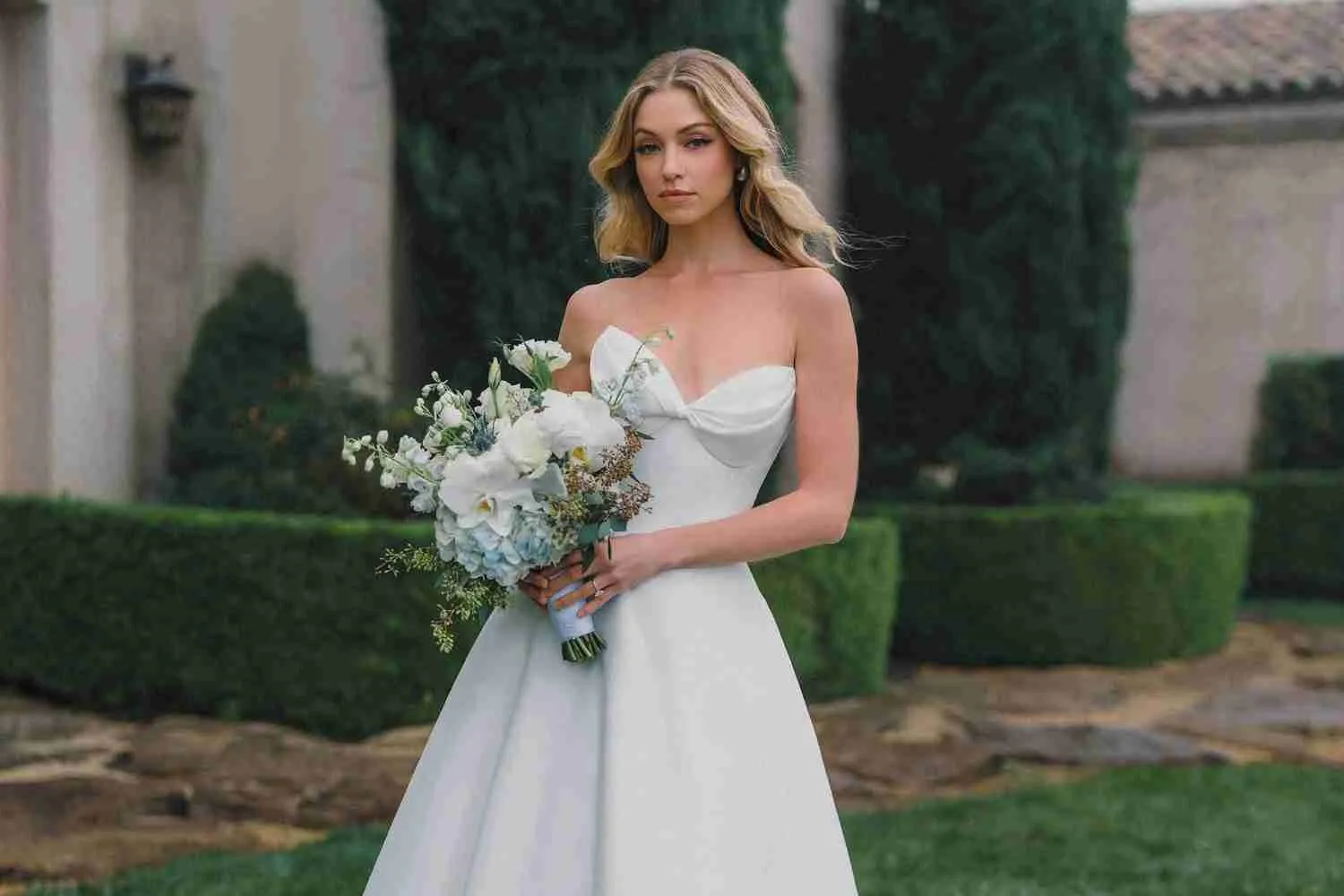 Allure Bridals A1474 dove satin ballgown with a strapless cat-eye neckline
