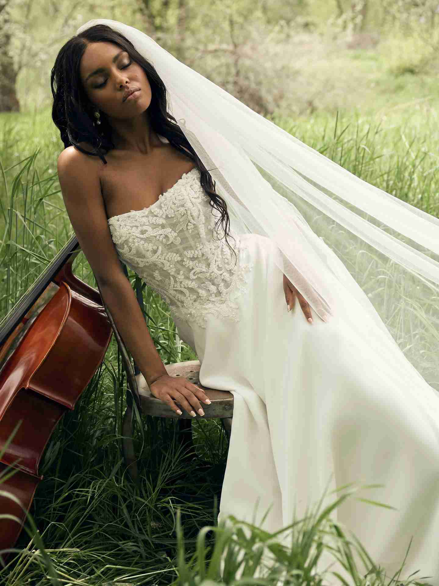 Rebecca Ingram Hazel A-line wedding dress with a beaded lace bodice, photographed outdoors